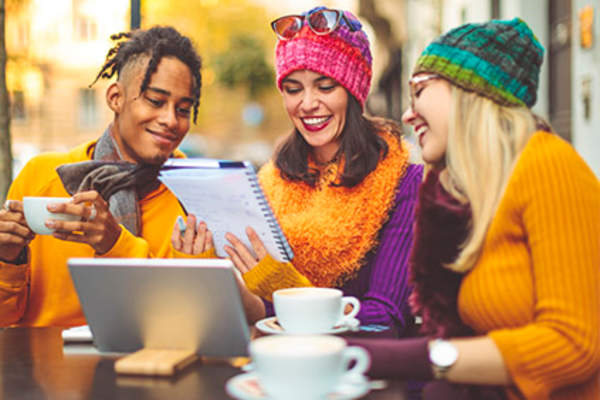 Friends in an outdoor cafe.