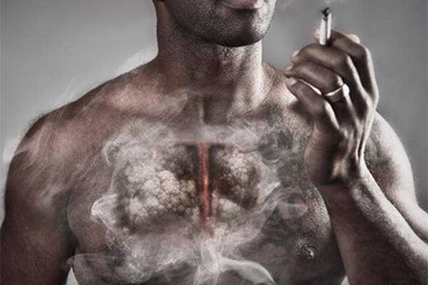 Man smoking, showing the health effects of cigarettes.