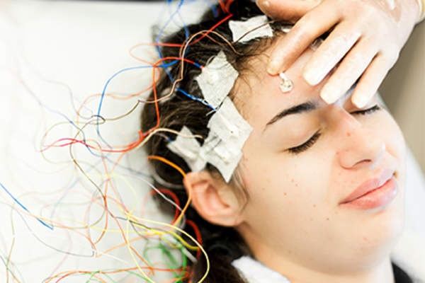 Woman having an EEG.