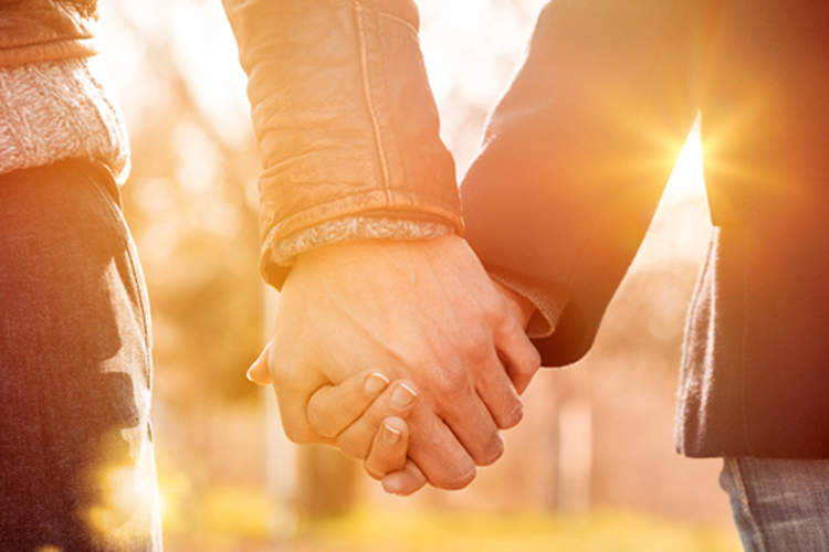 couple holding hands