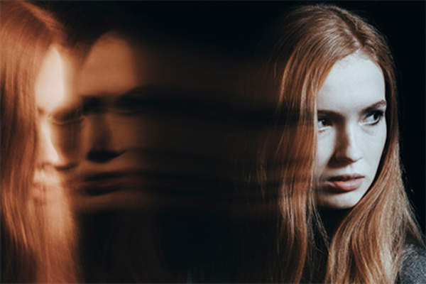 Young woman with paranoia.