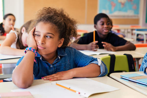 student daydreaming in class.