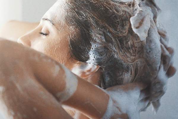 woman shampooing
