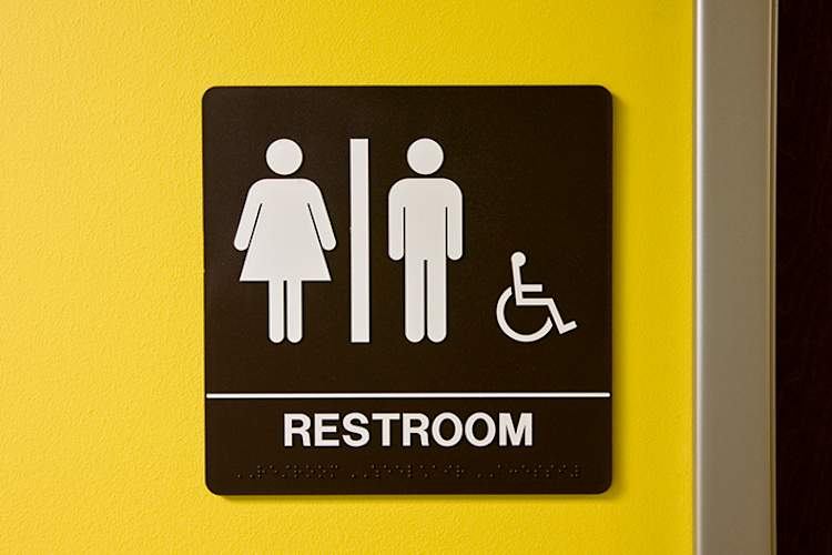 Restroom access sign.