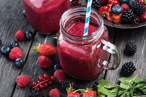 Summer berries smoothie in mason jar