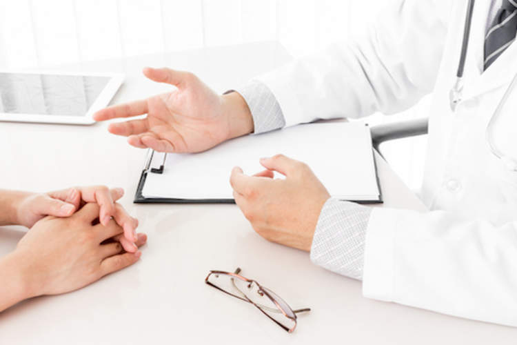 Doctor talking to patient.