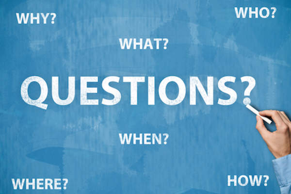 Questions on blue blackboard.