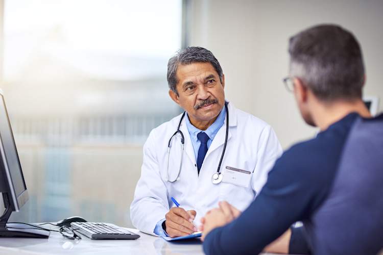 Oncologist talking to patient.