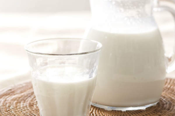 pitcher and glass of milk