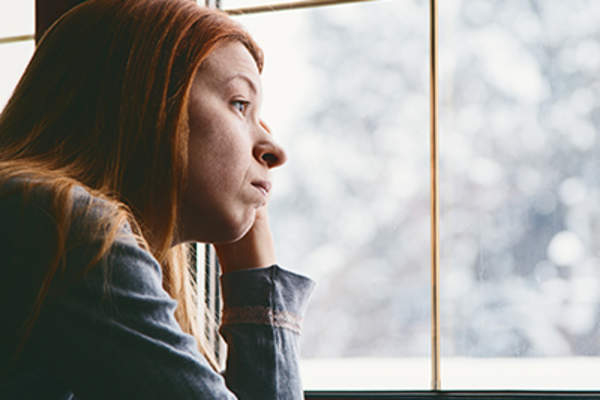 Woman depressed during the winter.
