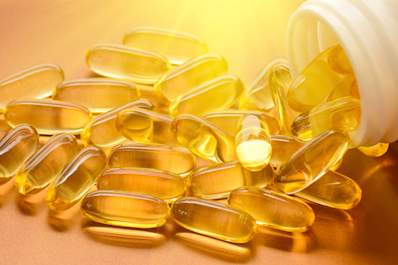 Vitamin D capsules in sunshine.