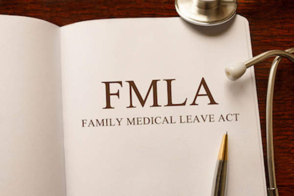 FMLA law book concept, know your rights.