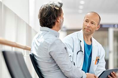 Doctor discussing treatment with a patient.