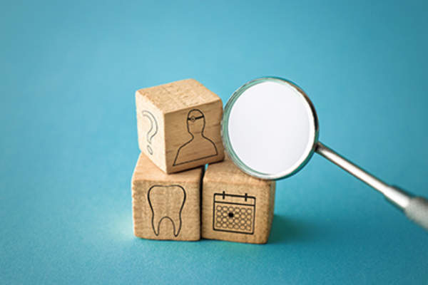 Dental appointment concept in blocks.