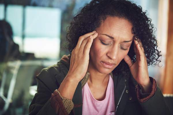 Woman having a migraine