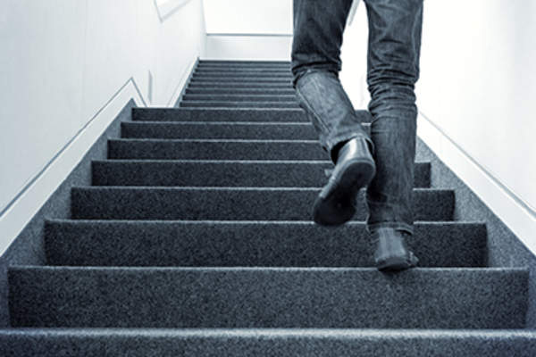 Man walking upstairs.