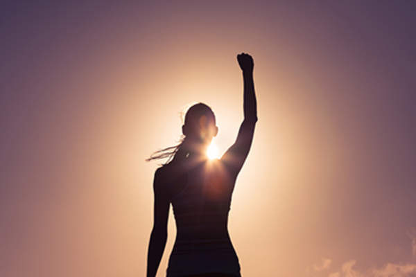 Woman with a victorious pose