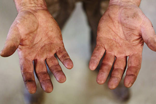Dirt covered hands.