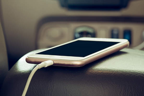 Phone charging in a car.