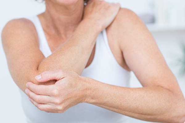 Woman with elbow pain.