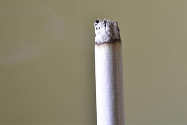 Burning cigarette.