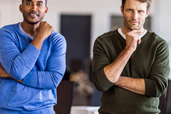 Men mirroring body position image.