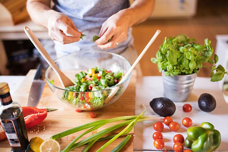 Preparing a healthy salad.