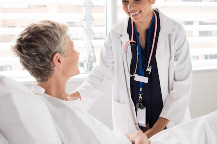 female consultant smiling and talking with patient