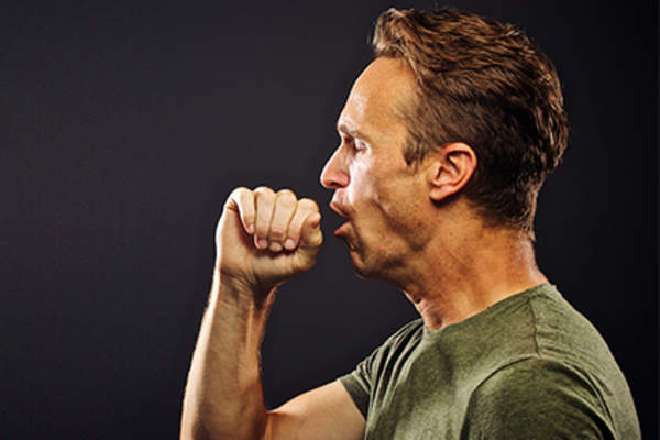 Man coughing.