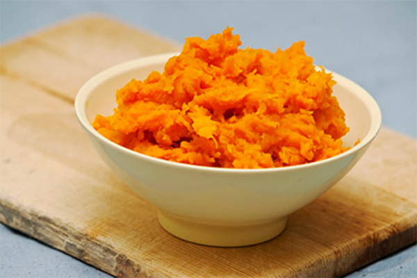 Bowl of mashed squash.