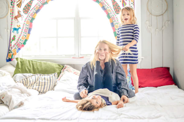 Mother with two daughters, a little overwhelmed.