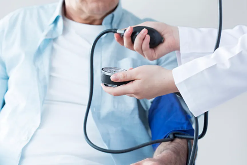 Man having blood pressure tested.