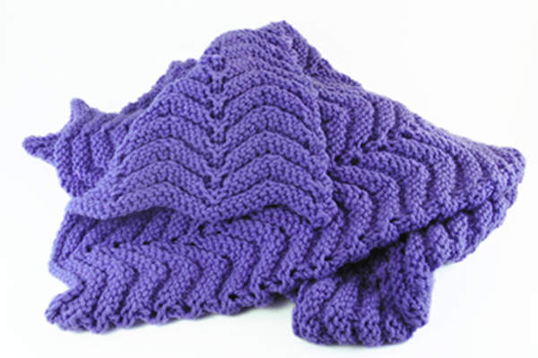 Crocheted purple blanket.