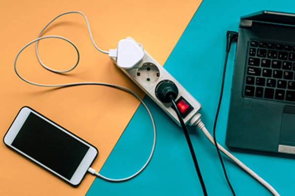 Phone and laptop being charged.