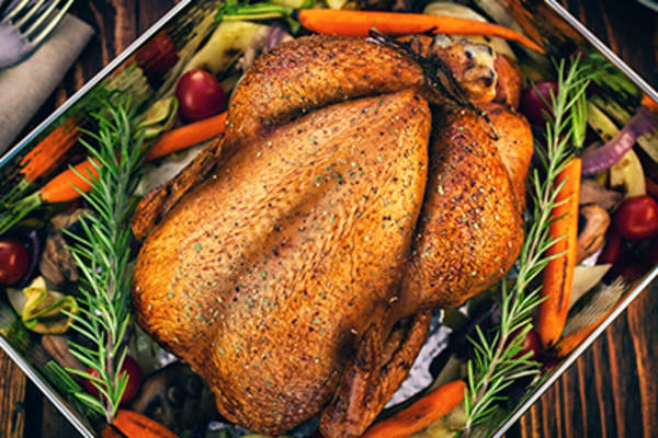 Roasted turkey with vegetables.