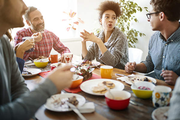 Family discussion at the breakfast table.