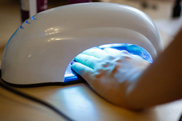 Ultraviolet light on nails.