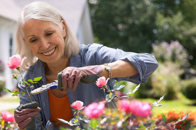 Woman having a good day with RA, spending it in her garden.