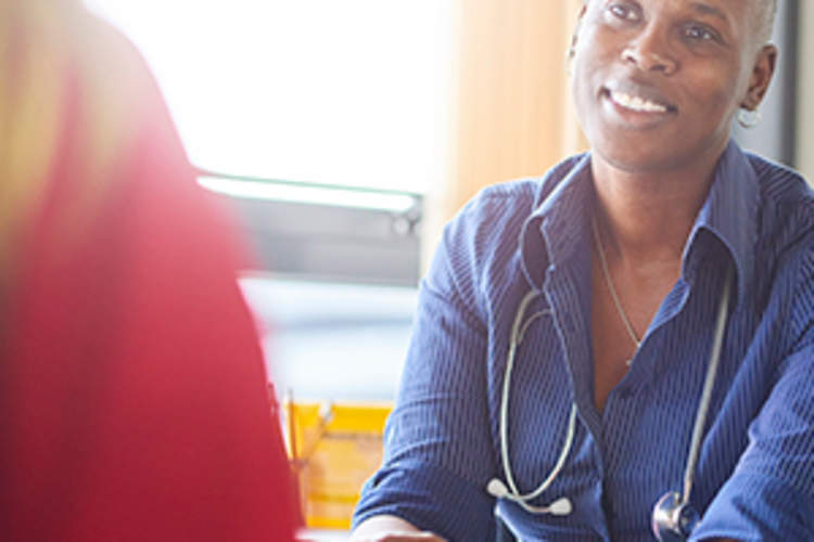 Doctor smiles at patient