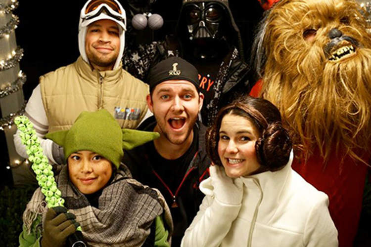 Kyle smith with characters from the movie Star Wars.