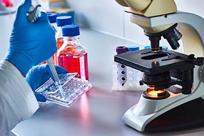 Cancer researcher in a lab.