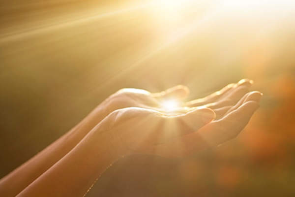 Sunlight on hands.