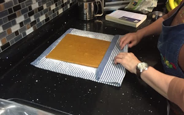 How to Make Gluten-Free Pumpkin Roll-rolling the pumpkin roll to cool