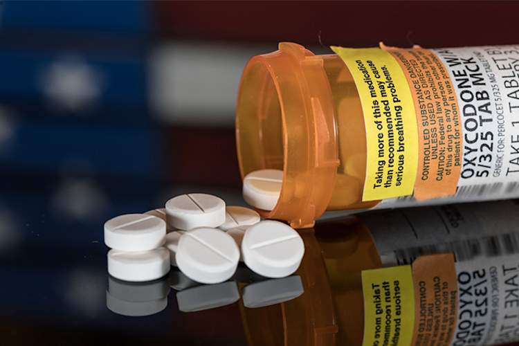 Bottle of prescription opioid pain relievers, narcotics.