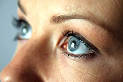 Close up of woman's blue eyes.