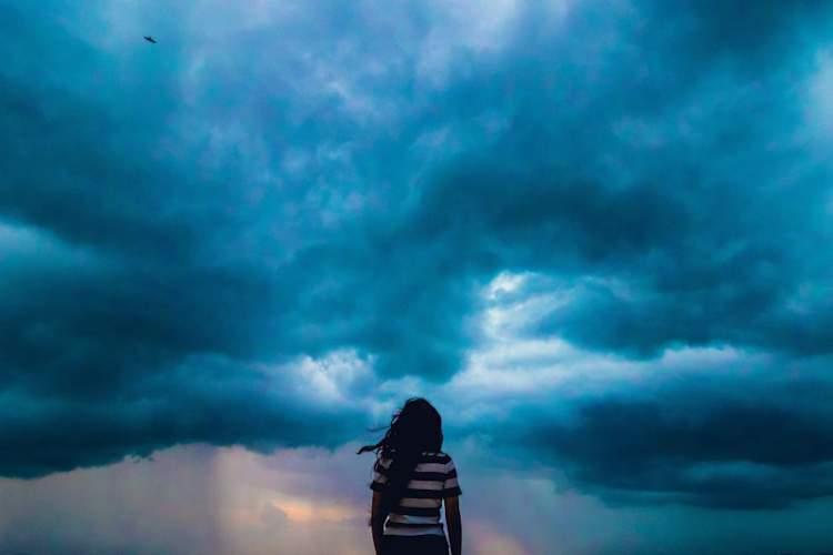 woman looking at storm