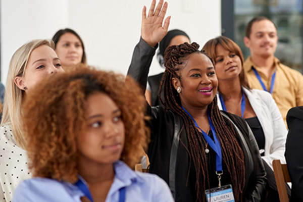 People in a work meeting or conference.