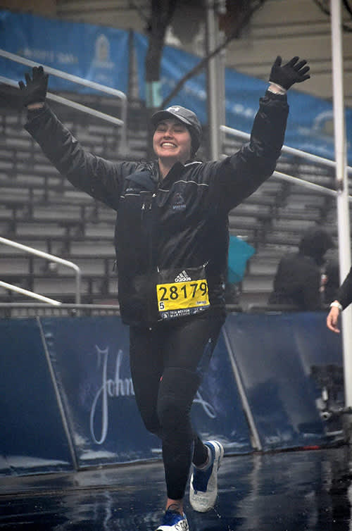 Casey McNamara running in the Boston Marathon.
