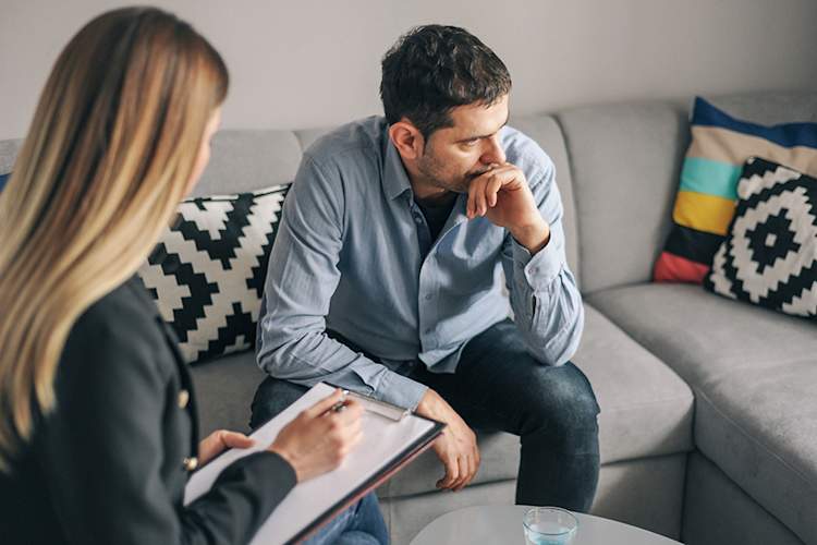 Man talking to a therapist