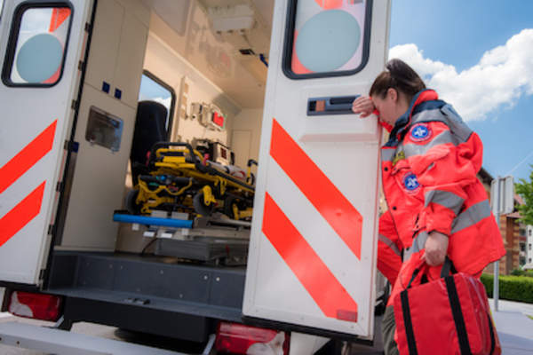 Stressed tired EMT worker.